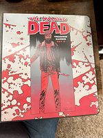 Front cover of binder labelled The Walking Dead Trading Cards Set 2