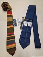 Both neckties side by side showing full designs