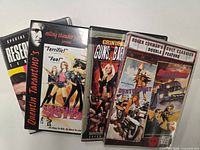 Group shot of all four DVD cases upright and fanned