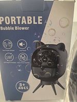 Retail box showing product image and feature icons