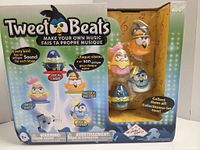 Front of opened retail box showing product name, age rating, and visible bird figures