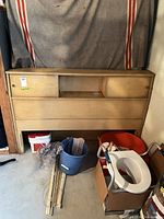 Full view of wood storage headboard front