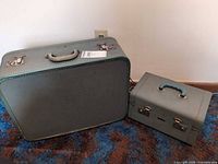 Both Travelgard suitcases side by side
