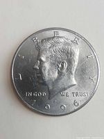 Obverse of 1996 Kennedy half dollar showing portrait and date
