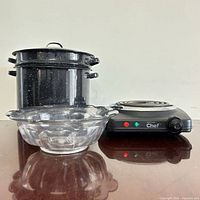 All items together: stock pot with lid, hot plate, glass bowl