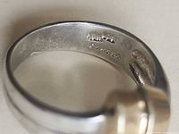 Interior hallmark showing 10K and 925 stamps