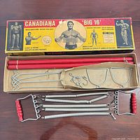 Overview of Weider Canadiana Big 16 kit with box, springs, handles, rods, attachments