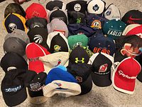 Full lot front view showing 31 hats in rows