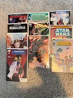 All eleven bagged/boarded Star Wars single-issue comics laid out