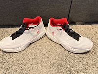 Side view of both shoes showing uppers, Jumpman logos and overall condition