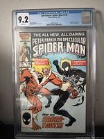 Front view of CGC-encapsulated Spectacular Spider-Man #116 showing 9.2 grade label and cover art