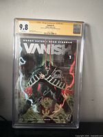 Front view of CGC graded Vanish #1 comic showing 9.8 grade and signatures