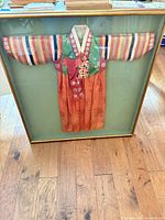 Full view of framed kimono showing colors, frame style and condition