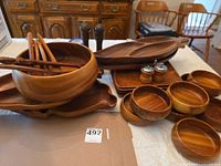 overall view of full wooden serveware collection on table