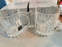 Two Mikasa crystal mugs with number 1 handles and boxes