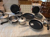 Group of mixed cookware pieces on table