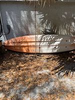 Full view of hull, orange-to-white coloration, overall length and condition