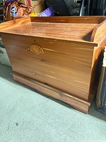 front and side view of wooden chest