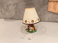 Lamp assembled displaying resin base and patterned shade