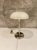 Front view of full lamp with cord and plug visible