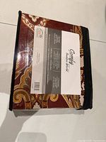 Front of sealed package showing brand and series information