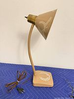 Lamp full side view showing color, shape, cord, plug