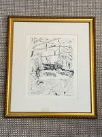 Full view of framed etching with gold frame and white mat