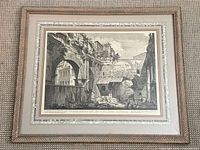 Front view of framed architectural etching with mat and frame visible