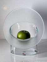 Front view showing circular frosted-clear vase with Iittala sticker