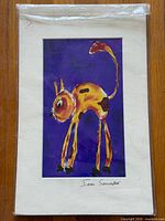 Full view of matted cat print in plastic sleeve