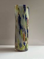 Full view of tall multicolour Murano vase