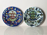 Both plates front view showing entire designs