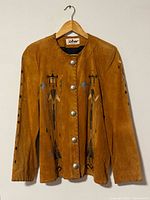 Front view showing painted motifs and buttons