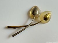 Front view showing dual resin petals and metal stems