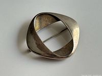 Front view of sterling silver modernist brooch