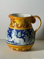 Overall view of the hand painted ceramic pitcher