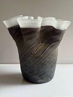 Full view of ruffled smoky grey Murano vase with gold foil detail
