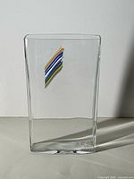 Front view of rectangular clear glass vase with rainbow stripe