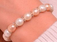 Bracelet worn on wrist showing pearl size and color variation