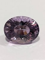 Front face of oval faceted amethyst gemstone