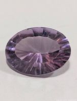 Top view of oval faceted amethyst