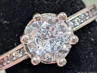 Front view of ring showing center CZ and prongs