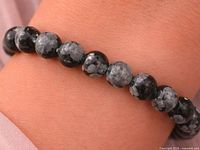 bracelet worn on wrist showing bead size and pattern