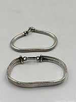 Both sterling bracelets side by side