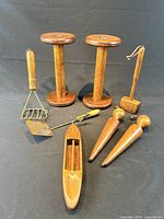 All nine antique wooden tools laid out