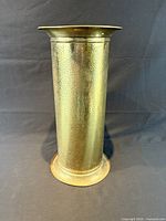 Full view of brass umbrella stand front