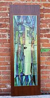 Full front view of ceramic tile mosaic mounted on wood