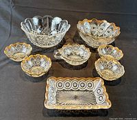 Group shot: serving bowl, four fruit dishes, handled candy dish, rectangular candy dish, cut-glass bowl