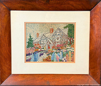 Full view of framed needlepoint with mat and wooden frame