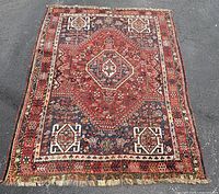 Full view of rug front showing pattern and wear